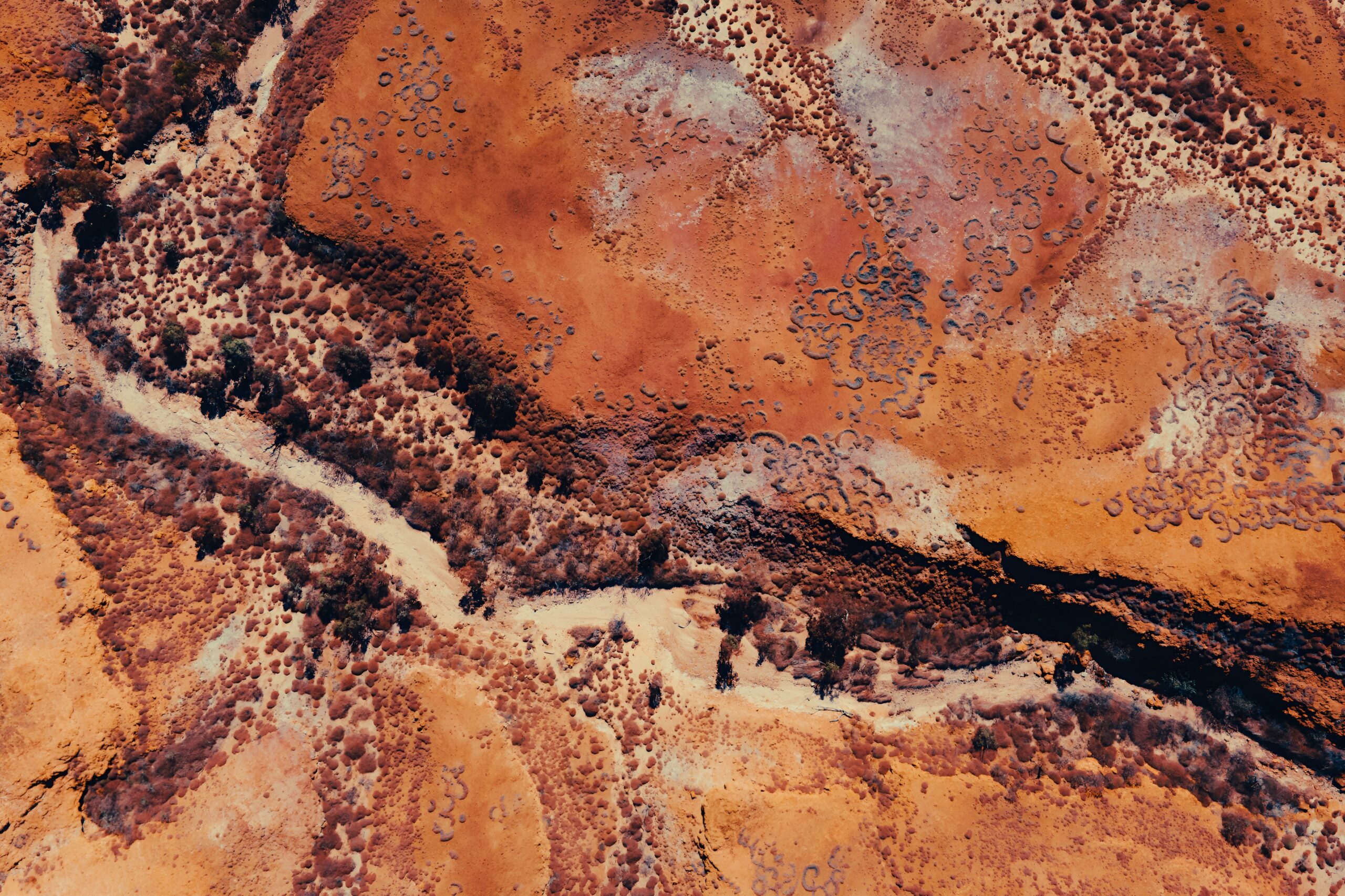 Abstract Aerial View of Desert Terrain With Red Rocks and Dirt Textures Patterns Kimberley Broome Pilbara Region Western Australia